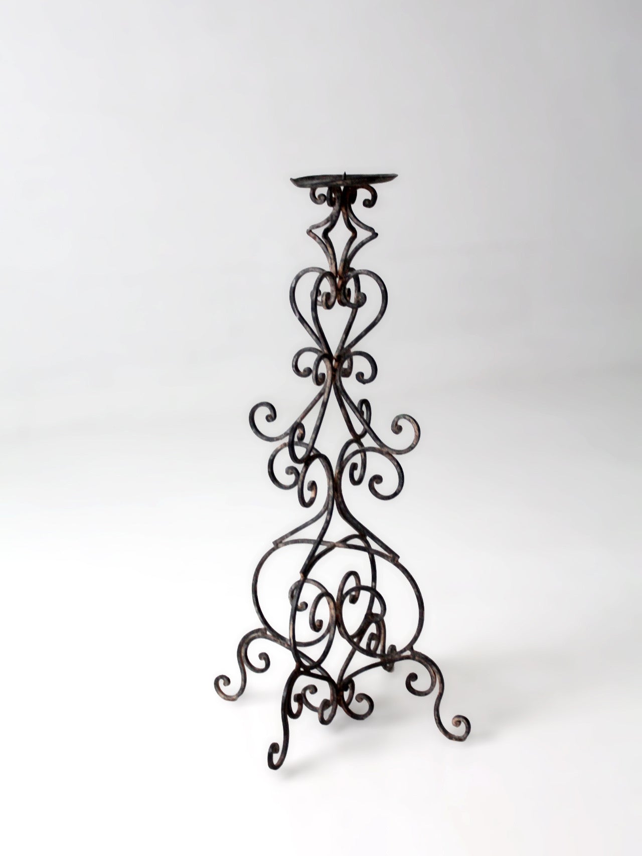 vintage scrollwork iron candle stand