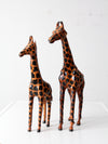 mid-century leather giraffes pair