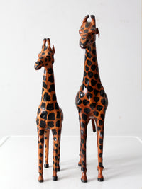 mid-century leather giraffes pair