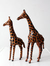 mid-century leather giraffes pair