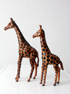 mid-century leather giraffes pair