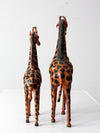 mid-century leather giraffes pair