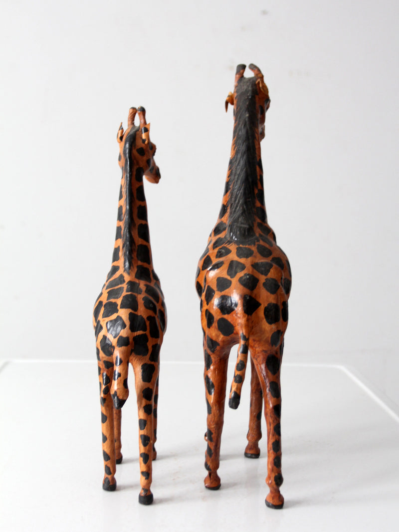 mid-century leather giraffes pair