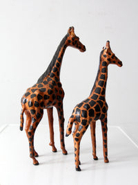 mid-century leather giraffes pair
