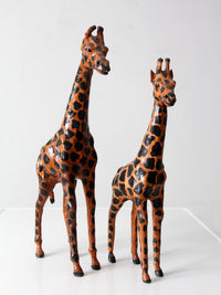 mid-century leather giraffes pair
