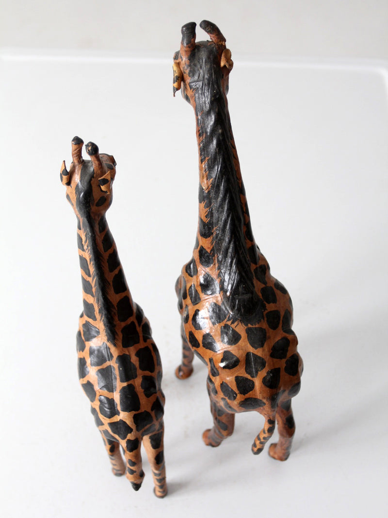 mid-century leather giraffes pair