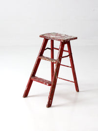 vintage red wooden step ladder