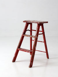 vintage red wooden step ladder