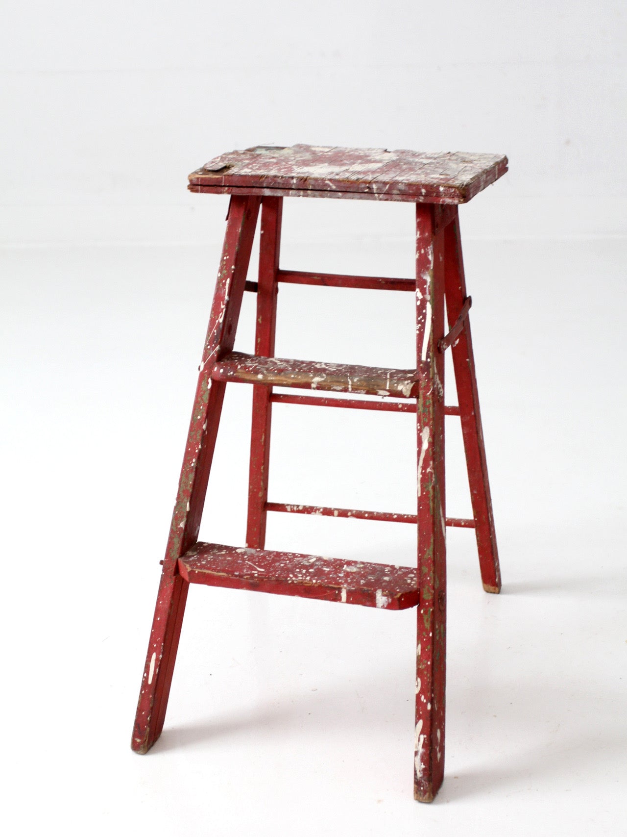 vintage red wooden step ladder