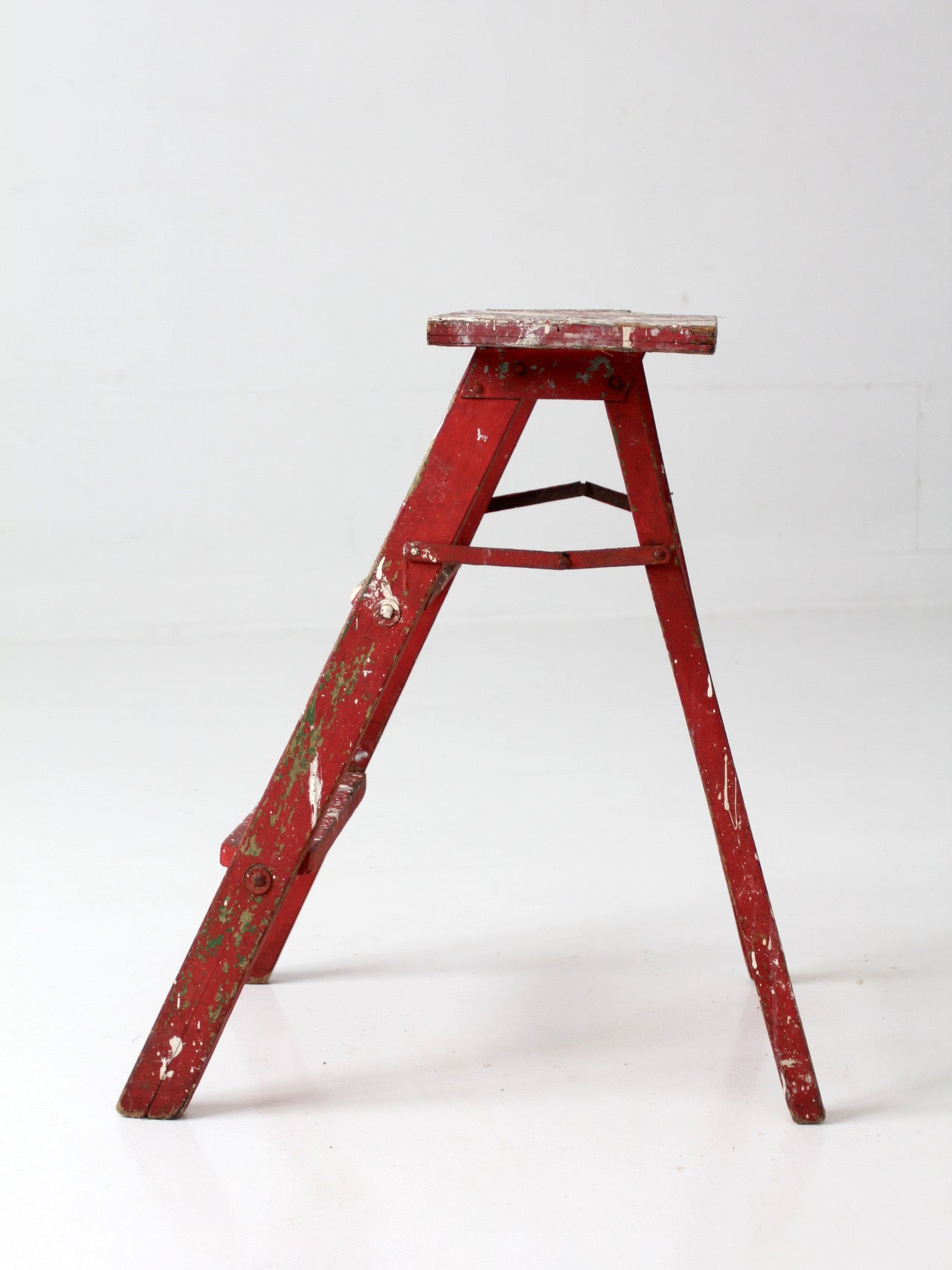 vintage red wooden step ladder