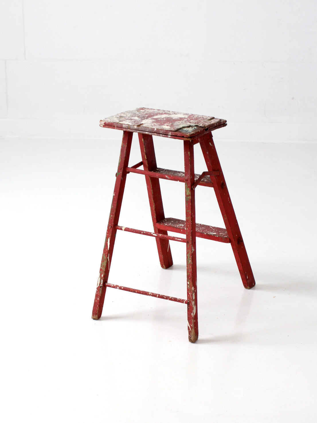vintage red wooden step ladder
