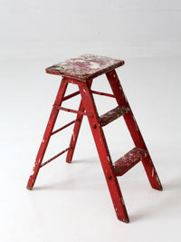 vintage red wooden step ladder