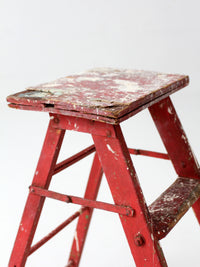 vintage red wooden step ladder