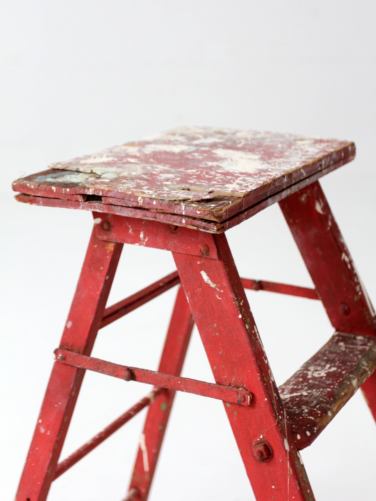 vintage red wooden step ladder