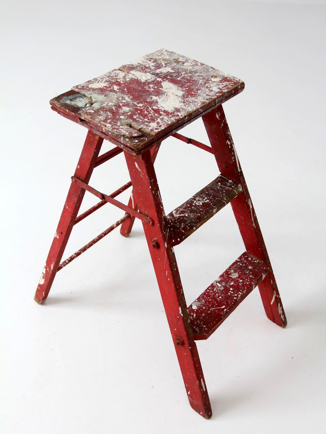 vintage red wooden step ladder