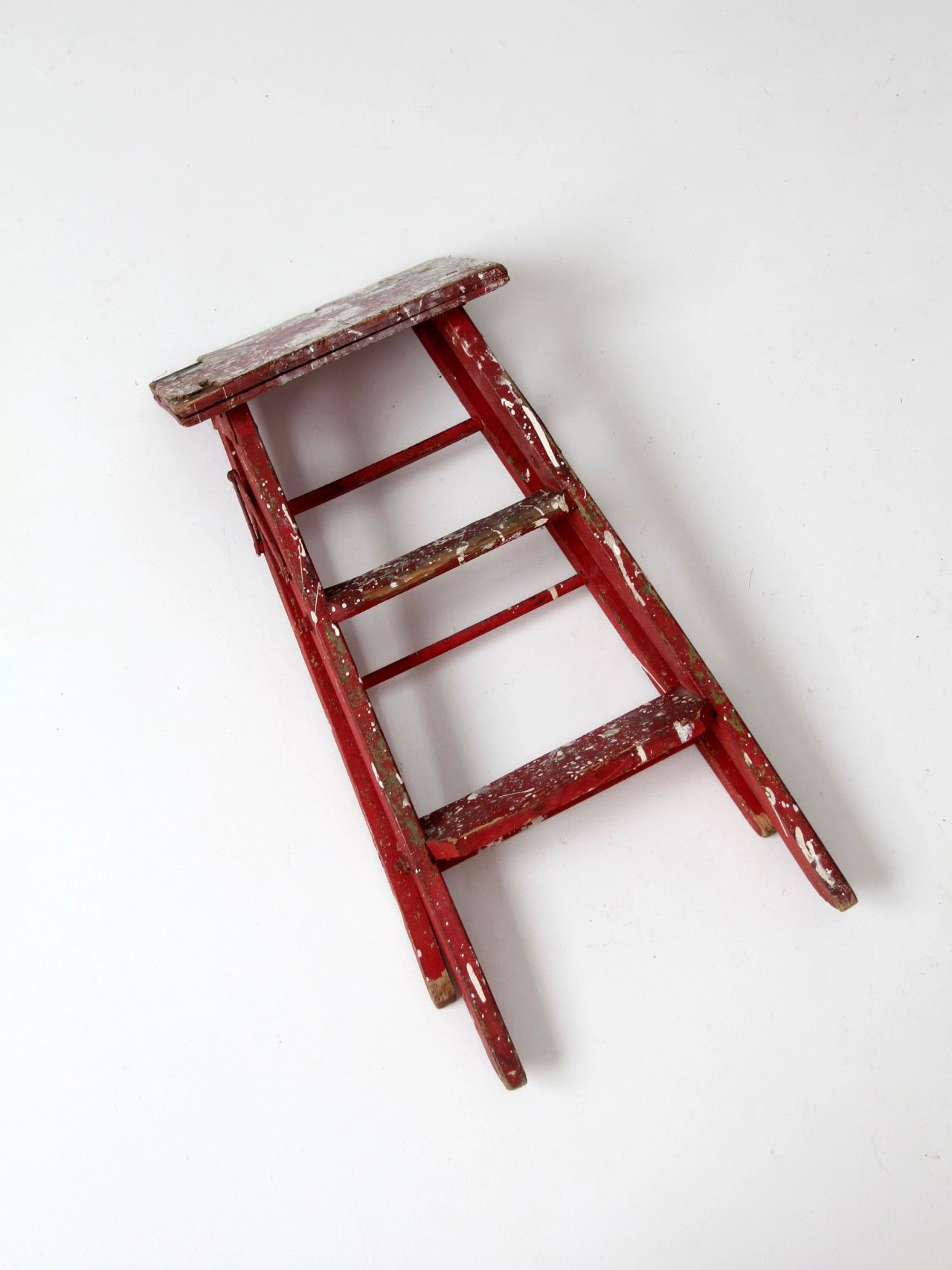 vintage red wooden step ladder