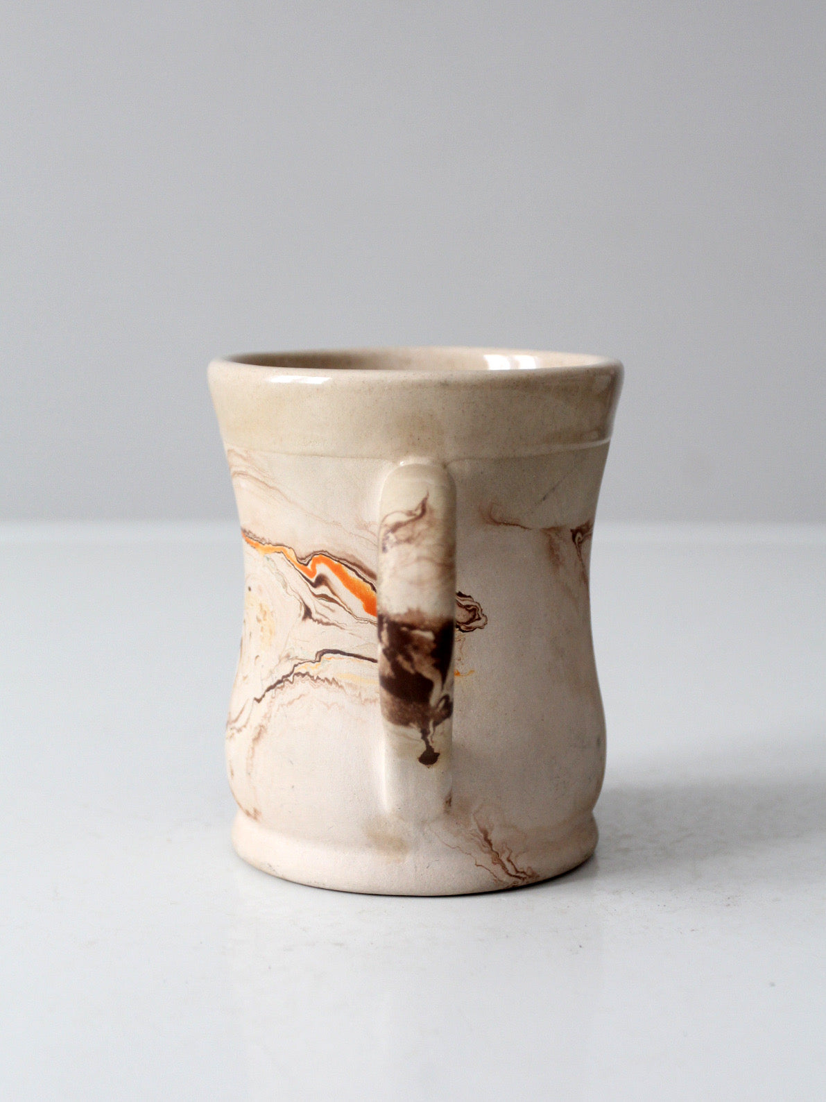 mid-century Nemadji Pottery swirl glaze mug
