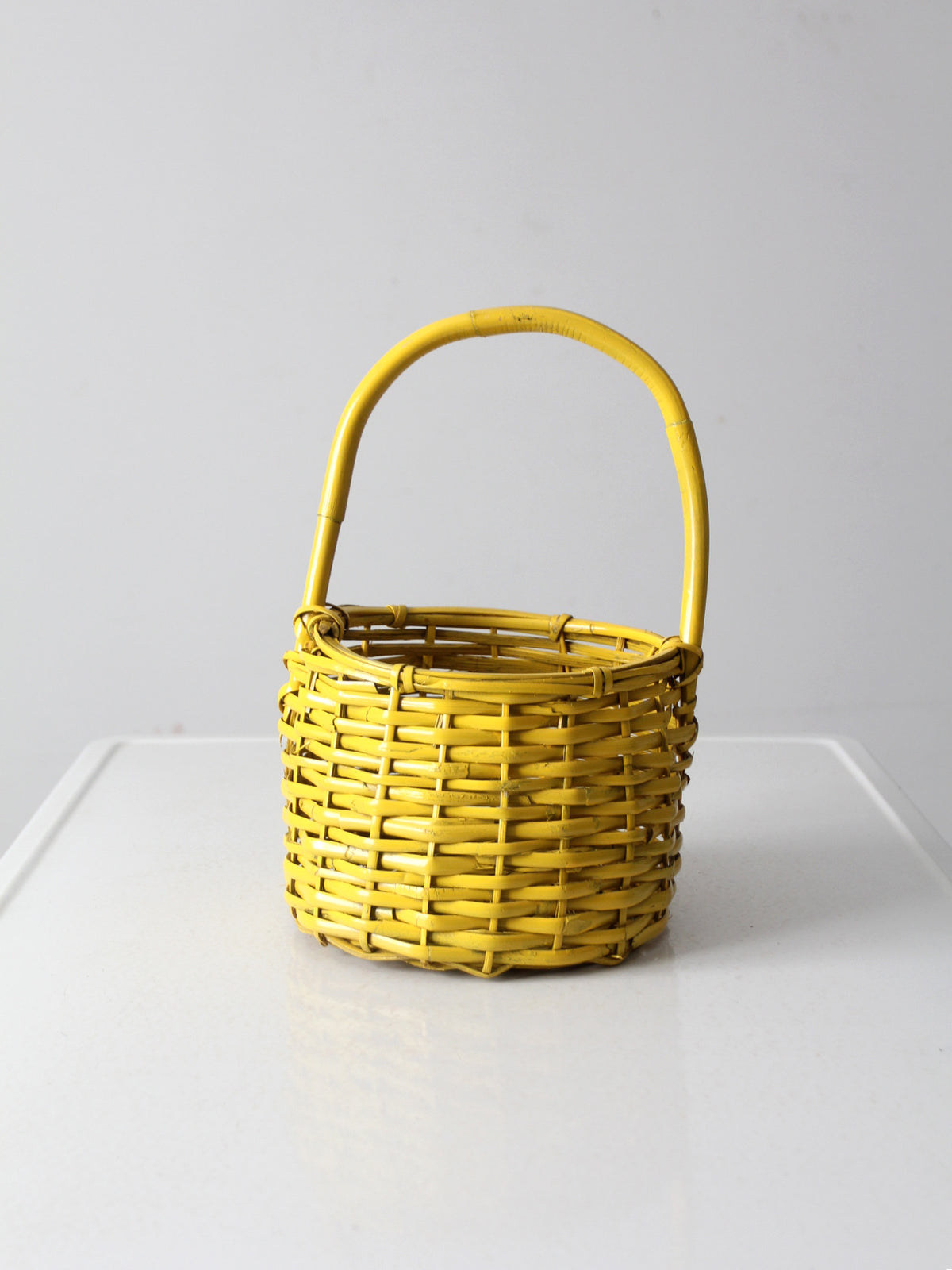 vintage yellow wicker handle basket