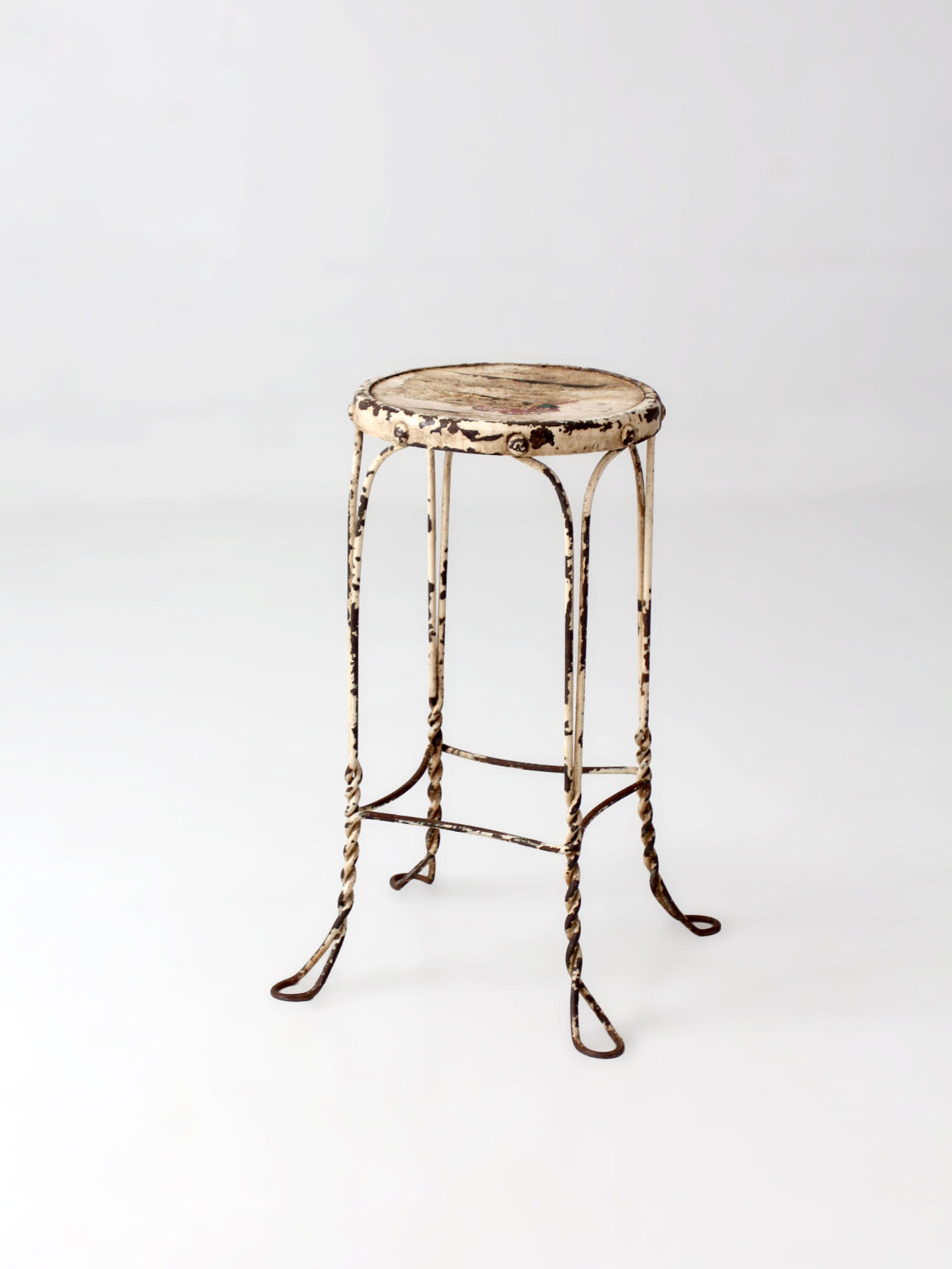 vintage twisted metal garden stool with wood top