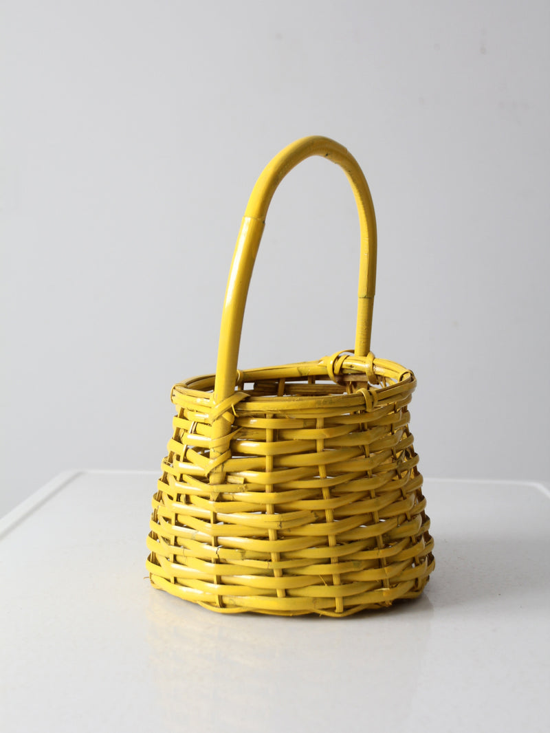 vintage yellow wicker handle basket