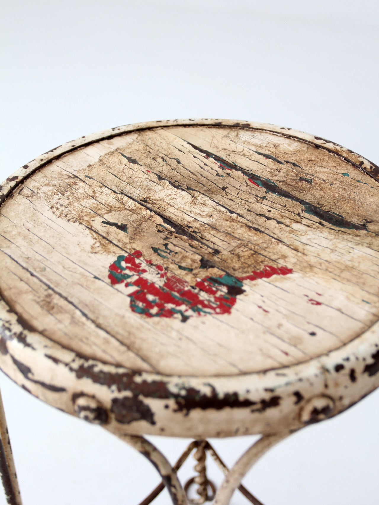 vintage twisted metal garden stool with wood top