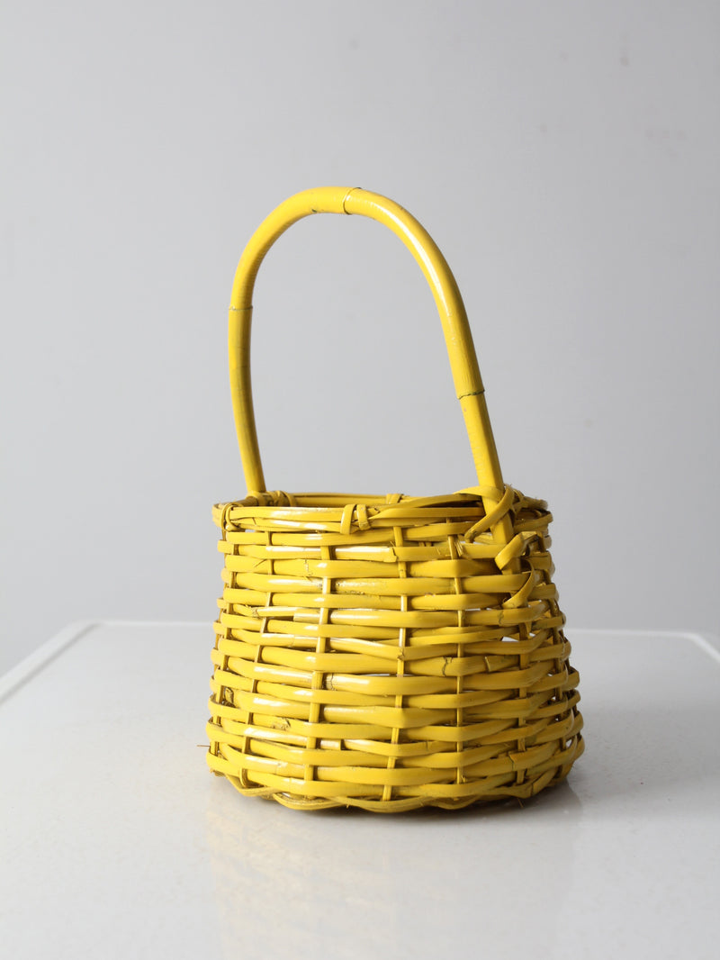 vintage yellow wicker handle basket