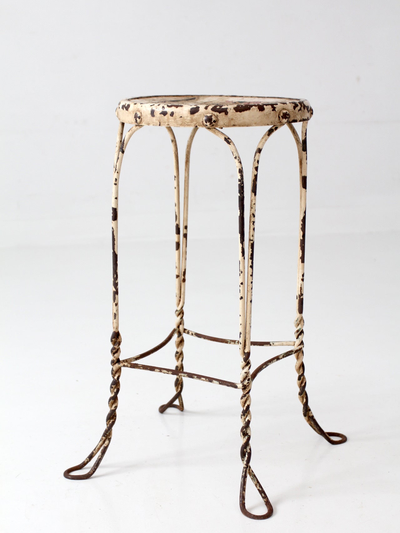 vintage twisted metal garden stool with wood top