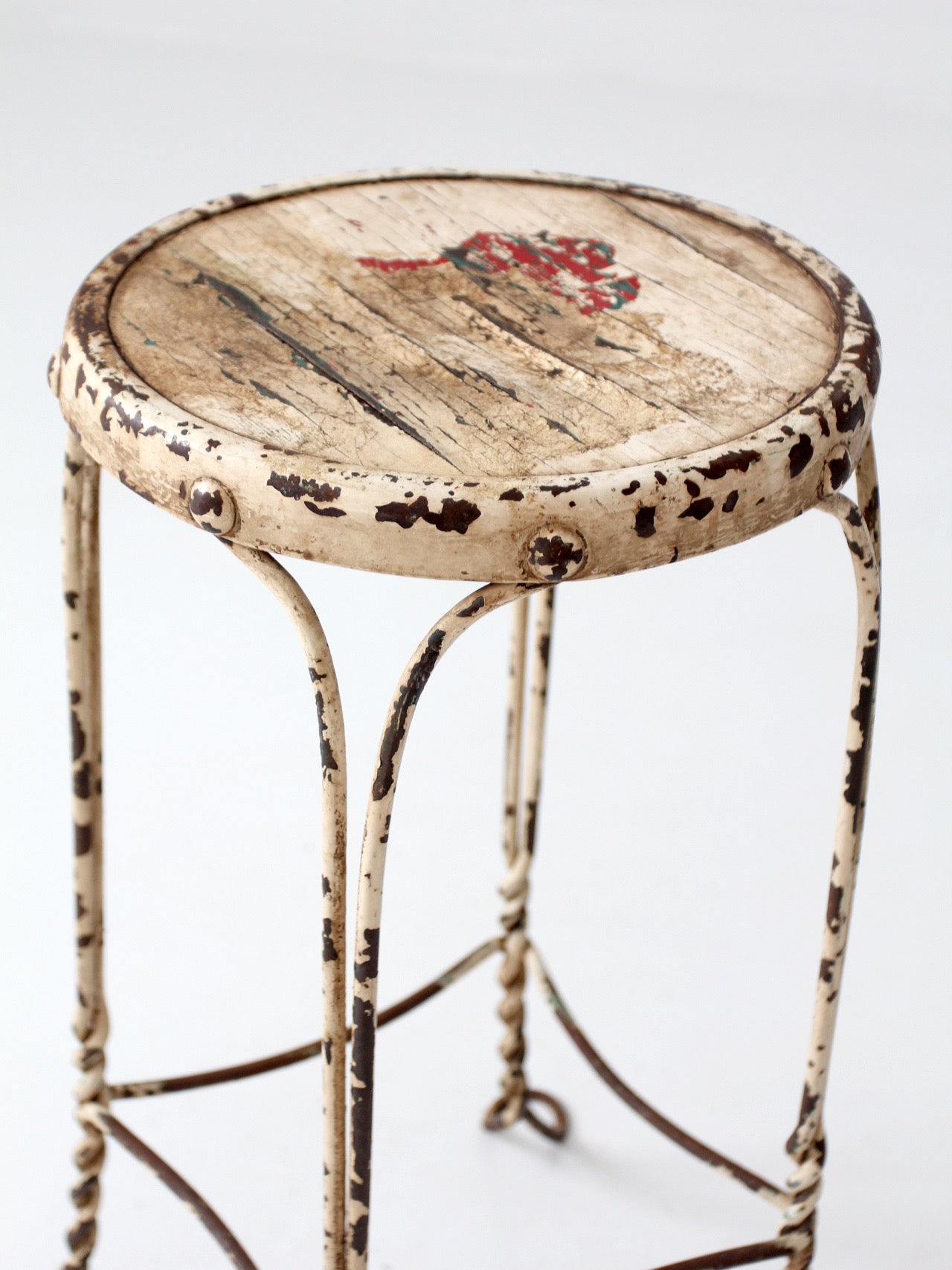 vintage twisted metal garden stool with wood top