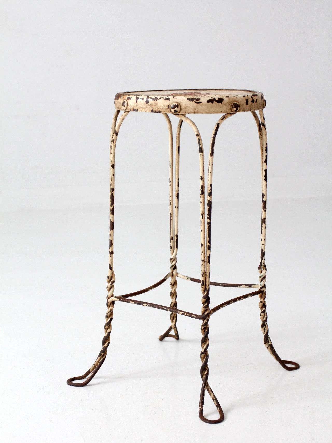 vintage twisted metal garden stool with wood top