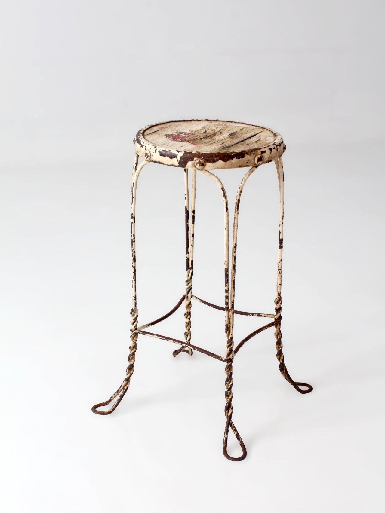 vintage twisted metal garden stool with wood top