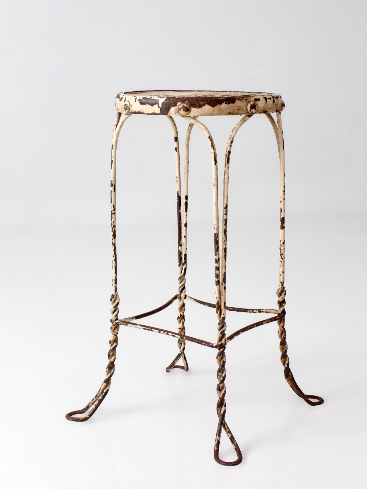 vintage twisted metal garden stool with wood top