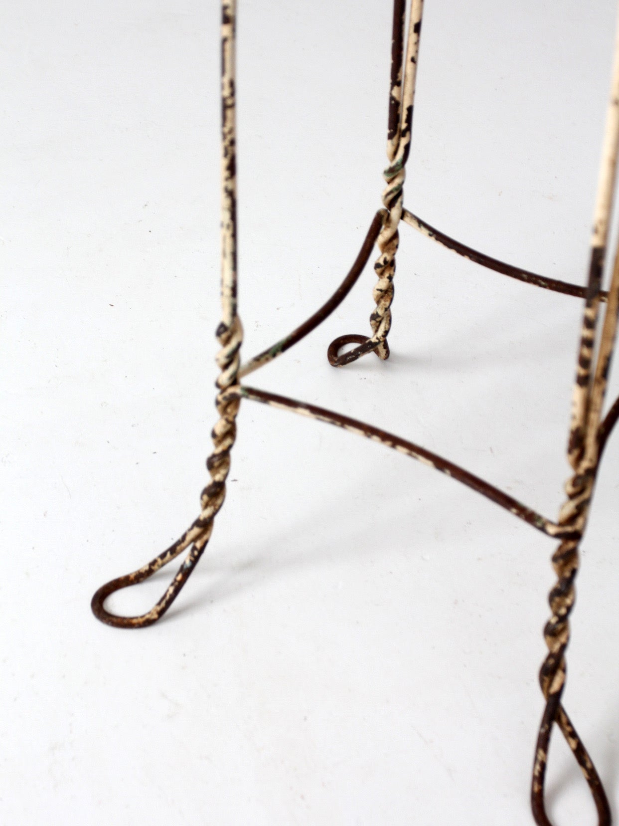 vintage twisted metal garden stool with wood top