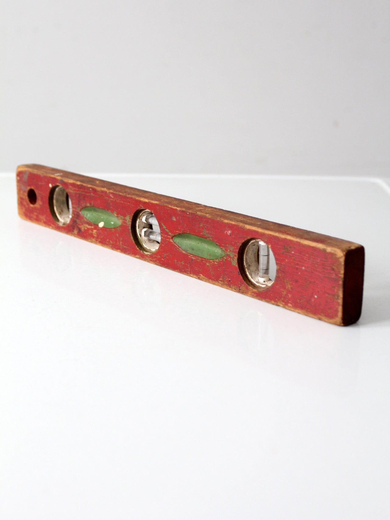 vintage red wood carpenter level