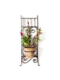 vintage Spanish Revival wrought iron wall planter sconce