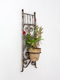vintage Spanish Revival wrought iron wall planter sconce