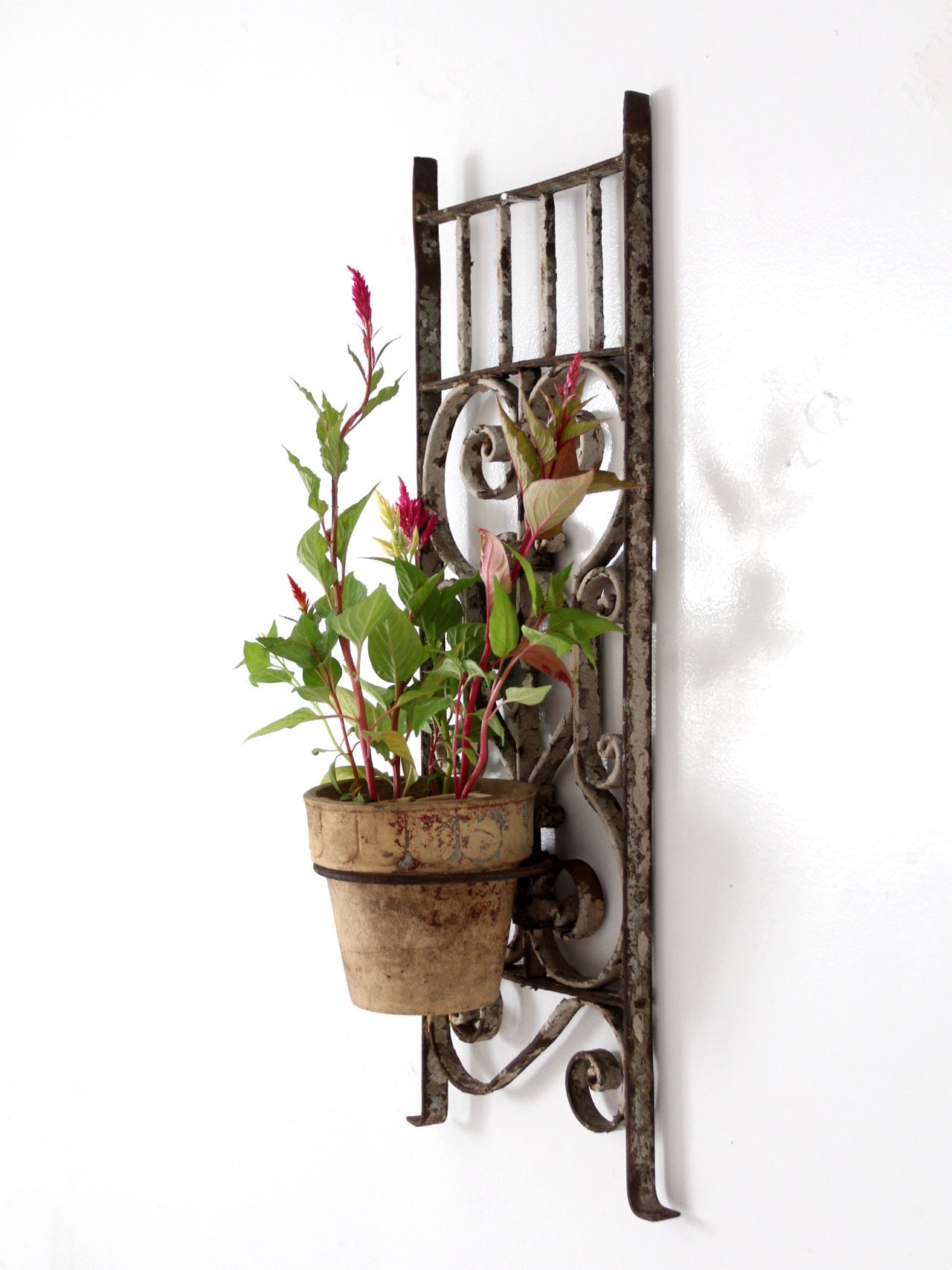 vintage Spanish Revival wrought iron wall planter sconce