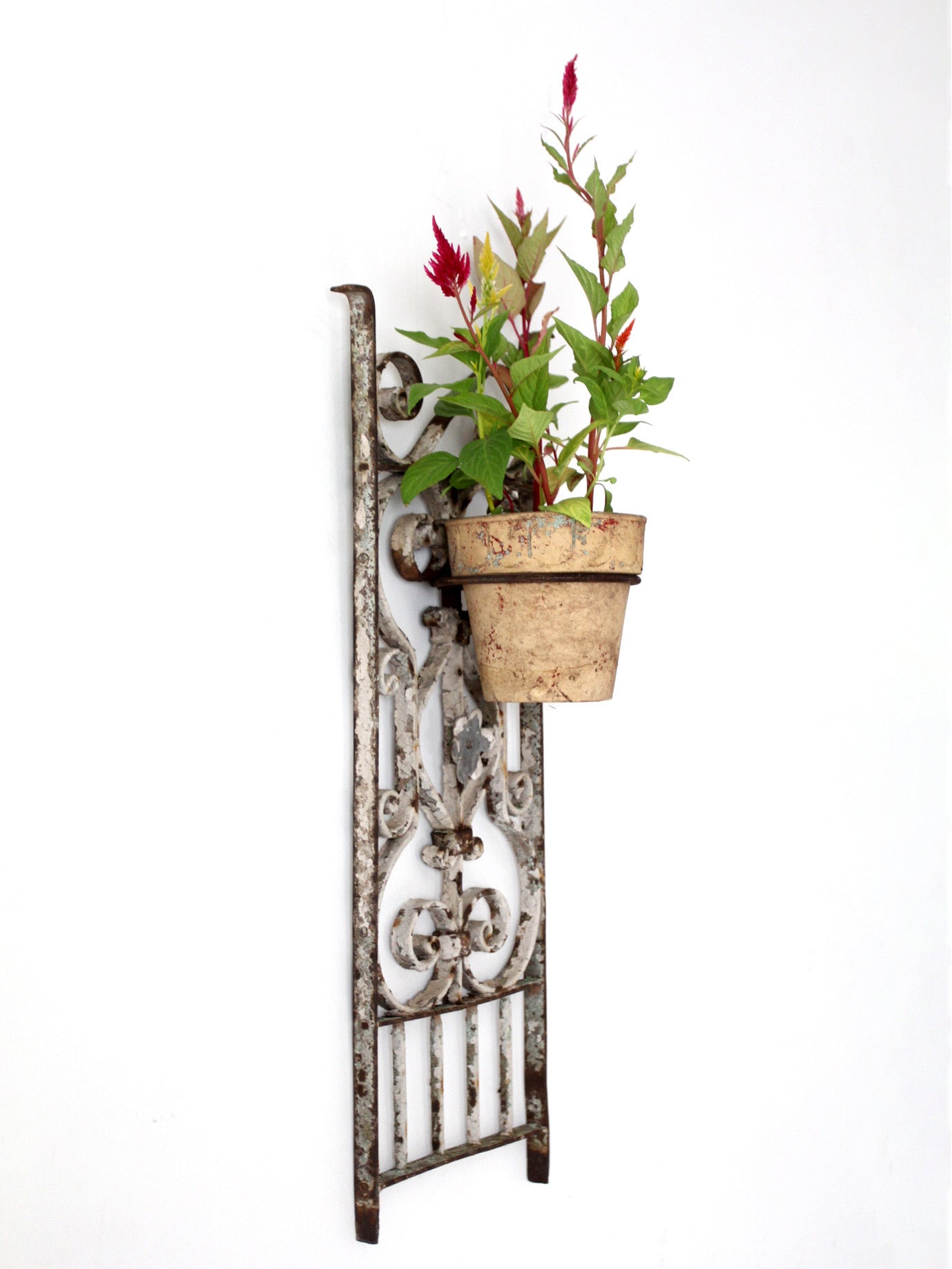 vintage Spanish Revival wrought iron wall planter sconce