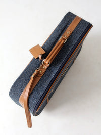 1980s Frequent Traveler blue tweed rolling suitcase