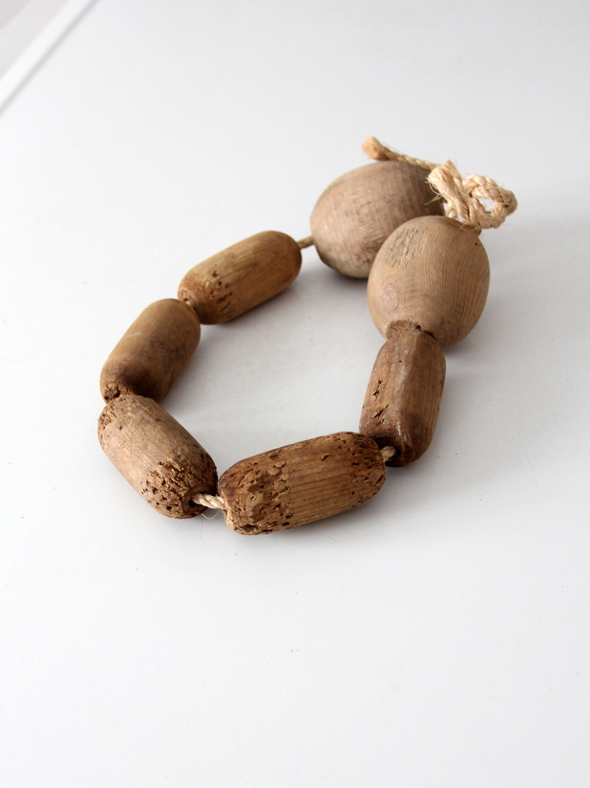 vintage wooden fishing net floats