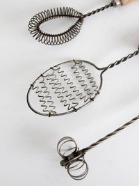 vintage red-handled whisk collection