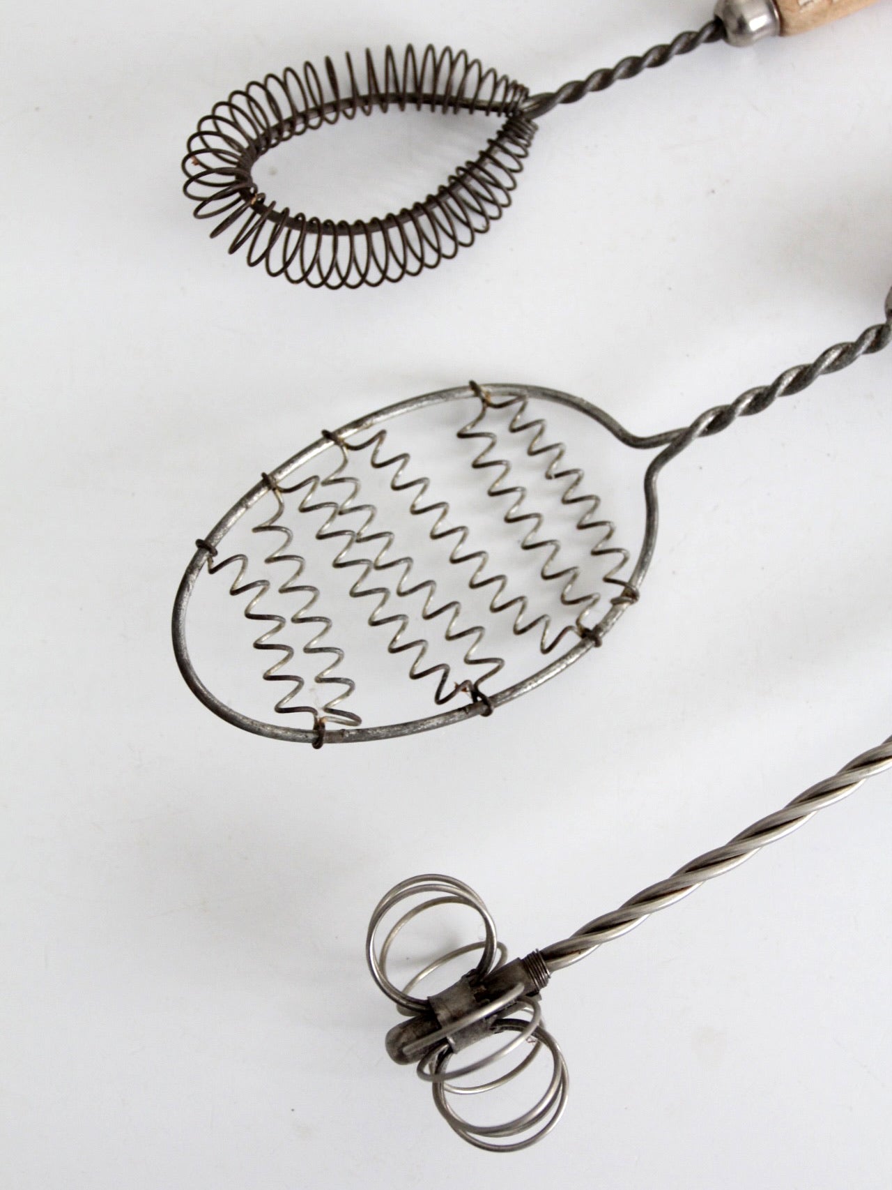 vintage red-handled whisk collection