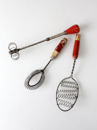 vintage red-handled whisk collection