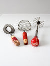 vintage red-handled whisk collection