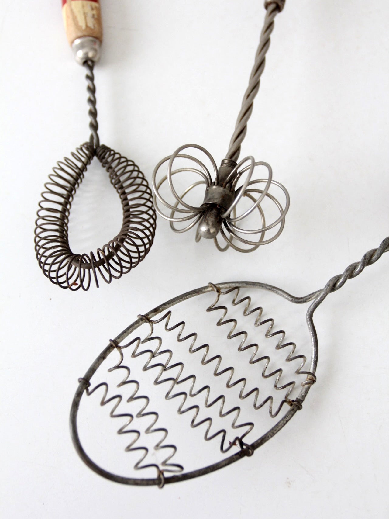 vintage red-handled whisk collection