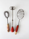 vintage red-handled whisk collection