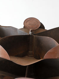 antique industrial rotating hardware bin