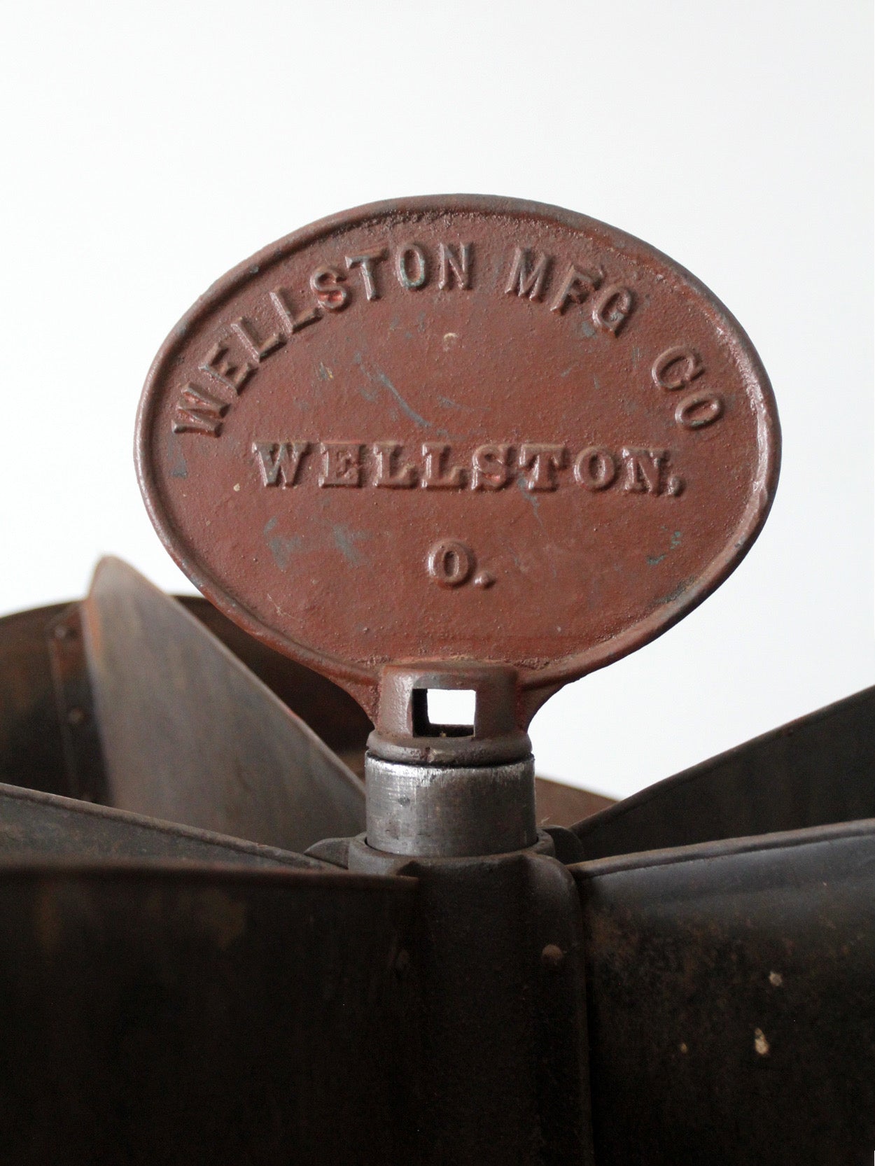 antique industrial rotating hardware bin