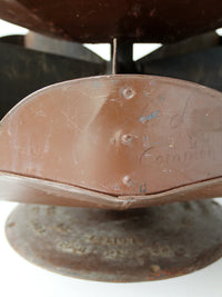 antique industrial rotating hardware bin