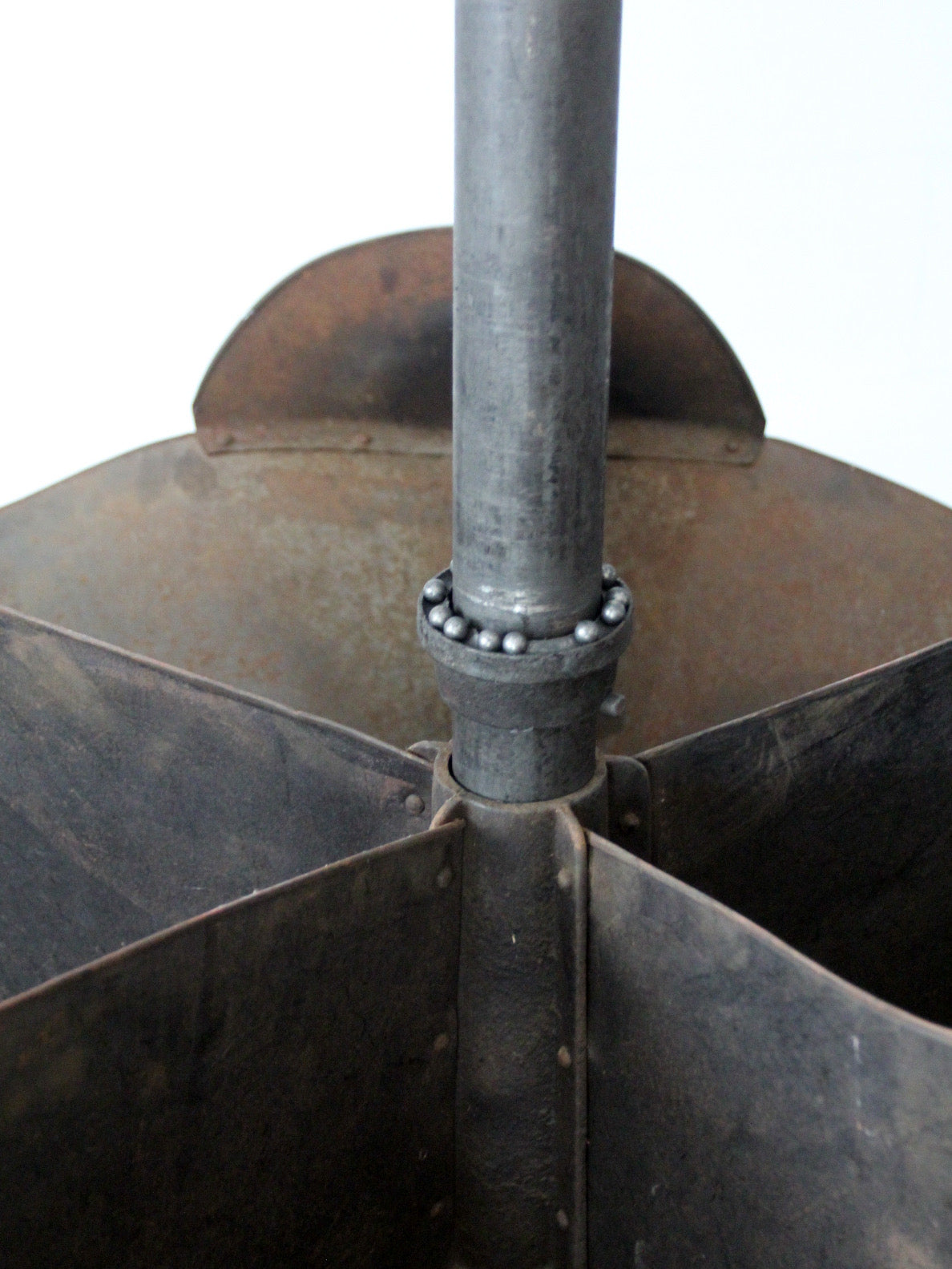antique industrial rotating hardware bin