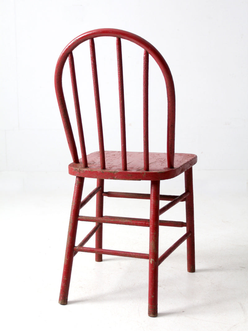 early 20th century red spindle back chair